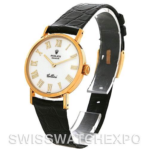The image shows a Rolex Cellini 4109 Women
s Yellow Gold White Dial 4109 Women
s Yellow Gold White Dial watch at a side angle, highlighting its gold case, white dial with Roman numerals, and black leather strap.
