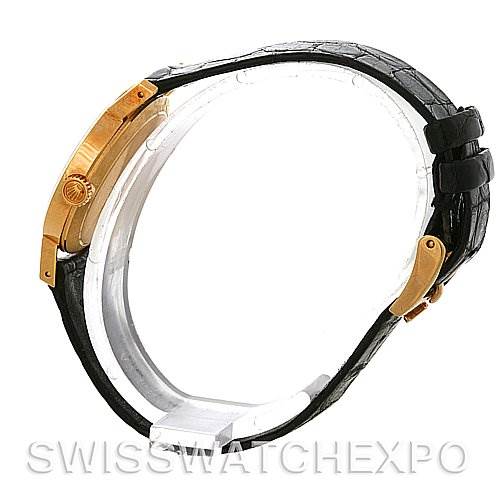 This side profile view showcases the case, crown, and black leather strap of the Rolex Cellini 4109 Women
s Yellow Gold White Dial 4109 Women
s Yellow Gold White Dial.