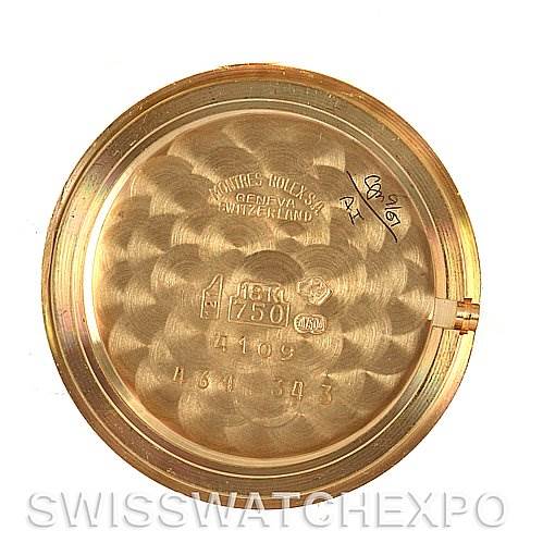 This image shows the inner side of the back casing of a Rolex Cellini 4109 Women
s Yellow Gold White Dial 4109 Women
s Yellow Gold White Dial watch, displaying inscriptions and engravings.