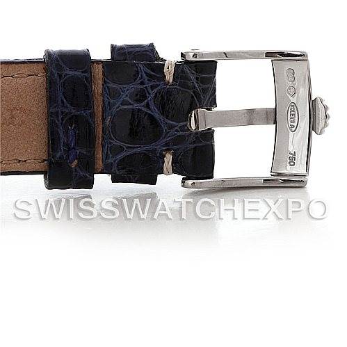 The image shows a close-up of the buckle and strap of a Rolex Cellini 6229 Women's White Gold White Dial 6229 Women's White Gold White Dial watch, showcasing the leather strap and metal clasp.