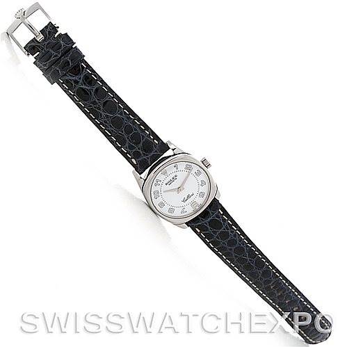 A Rolex Cellini 6229 Women's White Gold White Dial 6229 Women's White Gold White Dial watch is shown from an overhead angle, displaying its face, case, and full leather strap.