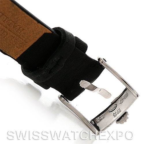 This image shows the buckle and part of the leather strap of a Rolex Cellini 6229 Women's White Gold Black Dial 6229 Women's White Gold Black Dial watch from a close-up angle.