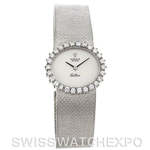 The image shows a front view of the Rolex Cellini Women's Yellow Gold Silver Dial Women's Yellow Gold Silver Dial watch, highlighting its bezel with diamonds, dial, and textured strap.