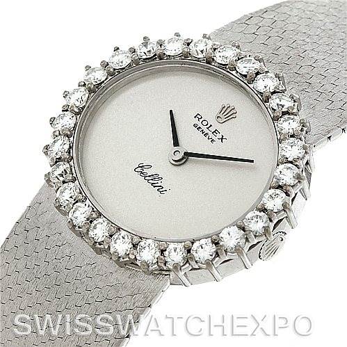 This image shows a top view of a Rolex Cellini Women's Yellow Gold Silver Dial Women's Yellow Gold Silver Dial watch featuring a diamond bezel and a textured metal strap.