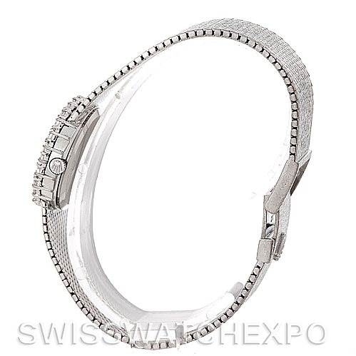 The image shows the Rolex Cellini Women's Yellow Gold Silver Dial Women's Yellow Gold Silver Dial watch from a side view, highlighting the watch case, crown, and clasp.