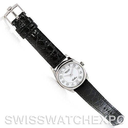 The image shows a top-down view of a Rolex Cellini 6229 Women's White Gold White Dial 6229 Women's White Gold White Dial watch, focusing on the face, strap, and buckle.