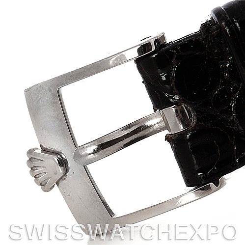 The image shows a close-up of the buckle and part of the leather strap of a Rolex Cellini 6229 Women's White Gold White Dial 6229 Women's White Gold White Dial watch.