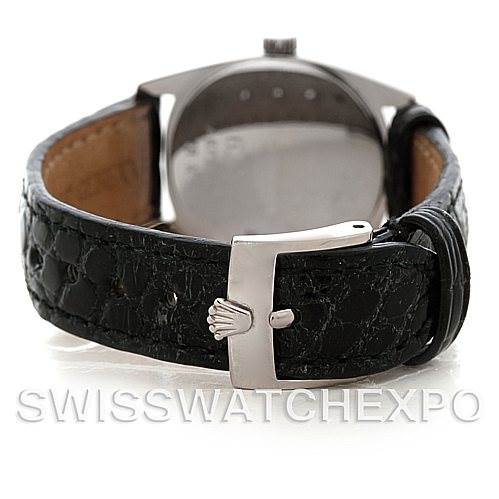 This image shows the back view of a Rolex Cellini 6229 Women's White Gold White Dial 6229 Women's White Gold White Dial watch, highlighting its black leather strap and silver clasp.