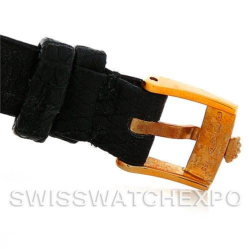 The image shows a close-up of the buckle and part of the black leather strap from a Rolex Cellini 5109 Women's Yellow Gold White Dial 5109 Women's Yellow Gold White Dial watch.