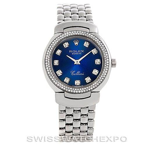 The image shows a frontal view of a Rolex Cellini 6671/9 Women's White Gold Blue Dial 6671/9 Women's White Gold Blue Dial watch displaying its face, diamond-studded bezel, and stainless steel bracelet.