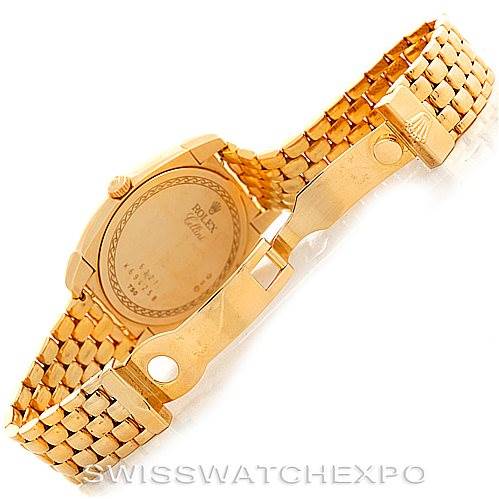 This image shows the back and clasp of a Rolex Cellini 6321 Women
s Yellow Gold Mother of Pearl Dial 6321 Women
s Yellow Gold Mother of Pearl Dial watch at a slight angle.