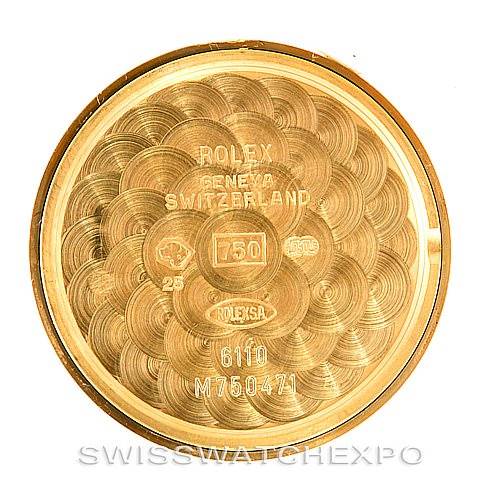 This image shows the inside case back of a Rolex Cellini 6110 Women's Yellow Gold Beige Dial 6110 Women's Yellow Gold Beige Dial watch, featuring engraved details and hallmarks.