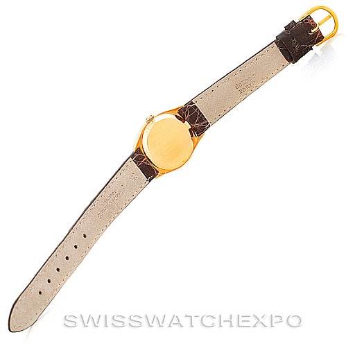 The image shows a Rolex Cellini 4129 Women's Yellow Gold White Dial 4129 Women's Yellow Gold White Dial watch viewed from the back, displaying the strap and clasp.