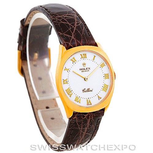 The Rolex Cellini 4129 Women's Yellow Gold White Dial 4129 Women's Yellow Gold White Dial watch is shown at a slight angle, displaying the face, gold case, and brown leather strap.