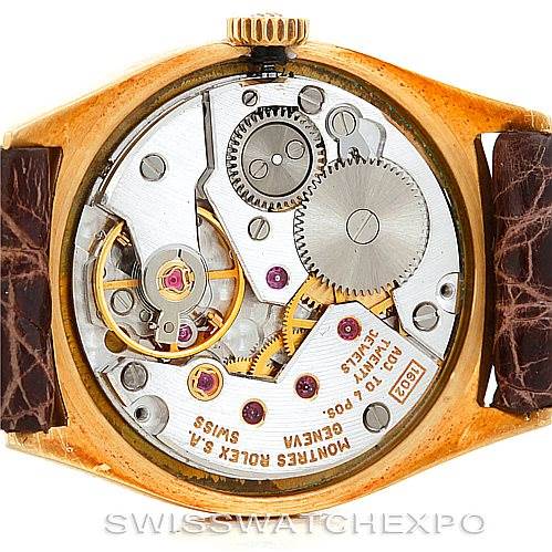 This image shows the internal mechanism and movement of a Rolex Cellini 4129 Women's Yellow Gold White Dial 4129 Women's Yellow Gold White Dial watch, viewed from the back case.