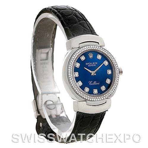 The image shows a Rolex Cellini 6671/9 Women's White Gold Blue Dial 6671/9 Women's White Gold Blue Dial watch at a three-quarter angle, displaying its face, case, bezel, and leather strap.