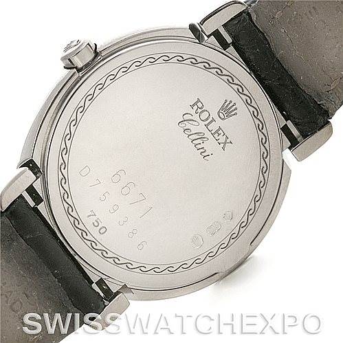 The image shows the back case of a Rolex Cellini 6671/9 Women's White Gold Blue Dial 6671/9 Women's White Gold Blue Dial watch, including its markings and straps.