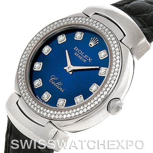 The image shows a close-up angled view of the Rolex Cellini 6671/9 Women's White Gold Blue Dial 6671/9 Women's White Gold Blue Dial watch face, bezel, and part of the strap.