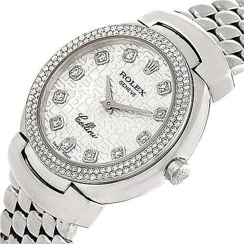 This image shows a Rolex Cellini 6671/9 Women
s White Gold Silver Dial 6671/9 Women
s White Gold Silver Dial watch from a slightly angled top view, highlighting its face, bezel, and part of the bracelet.