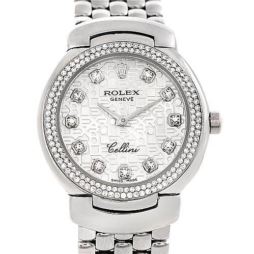 The image shows a front view of a Rolex Cellini 6671/9 Women
s White Gold Silver Dial 6671/9 Women
s White Gold Silver Dial watch, highlighting its face, bezel, crown, and part of the bracelet.