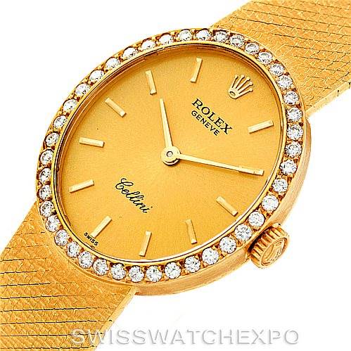 The image shows a top-angle view of a Rolex Cellini 4625 Women's Yellow Gold Champagne Dial 4625 Women's Yellow Gold Champagne Dial watch, highlighting its gold dial, diamond-studded bezel, and gold bracelet.