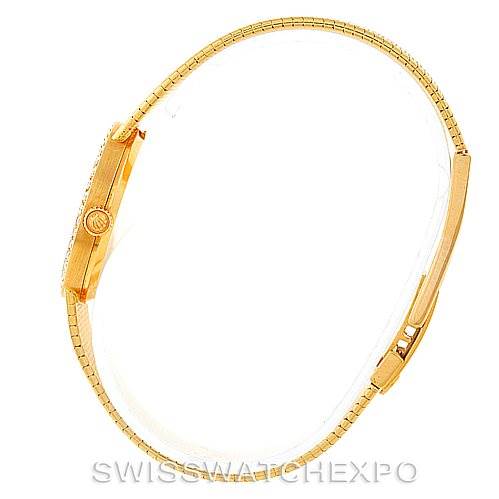 This image shows a side view of a Rolex Cellini 4625 Women's Yellow Gold Champagne Dial 4625 Women's Yellow Gold Champagne Dial watch, highlighting its gold case and mesh bracelet.
