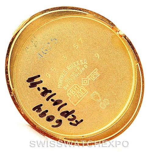 The image shows the inside of a case back for a Rolex Cellini 4625 Women's Yellow Gold Champagne Dial 4625 Women's Yellow Gold Champagne Dial watch, displaying hallmarks and numbers.