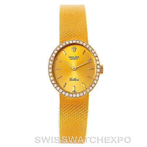 This Rolex Cellini 4625 Women's Yellow Gold Champagne Dial 4625 Women's Yellow Gold Champagne Dial watch is shown from a direct front angle, displaying its gold dial, diamond bezel, and textured yellow strap.