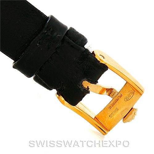 This image shows a close-up of a strap and buckle of a Rolex Cellini 4306 Women's Yellow Gold Grey Dial 4306 Women's Yellow Gold Grey Dial watch.