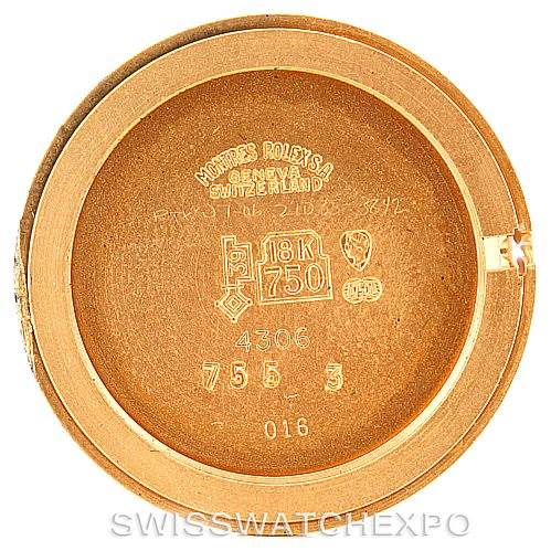 This image shows the inner side of the case back of the Rolex Cellini 4306 Women's Yellow Gold Grey Dial 4306 Women's Yellow Gold Grey Dial watch, featuring various engravings. 