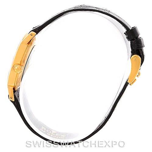 This is a side view of the Rolex Cellini 4306 Women's Yellow Gold Grey Dial 4306 Women's Yellow Gold Grey Dial watch, showing the case, bezel, and buckle on the strap.