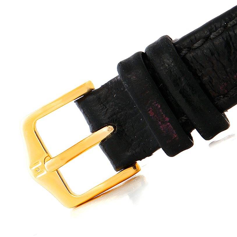 This image shows a close-up of the gold buckle and black leather strap of a Rolex Cellini 6229 Women's Yellow Gold White Dial 6229 Women's Yellow Gold White Dial model watch.