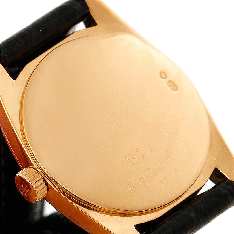 This image shows the back of the Rolex Cellini 6229 Women's Yellow Gold White Dial 6229 Women's Yellow Gold White Dial watch case, including the crown and part of the strap.