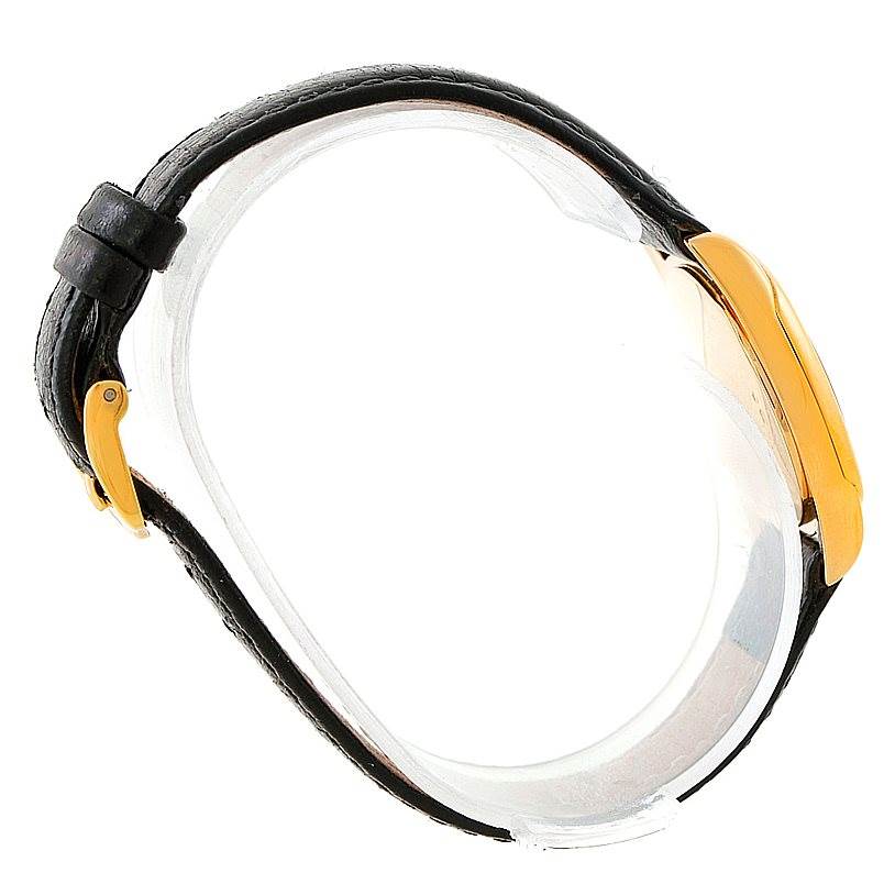 The Rolex Cellini 6229 Women's Yellow Gold White Dial 6229 Women's Yellow Gold White Dial watch is shown from a side angle, highlighting its leather strap and gold case.