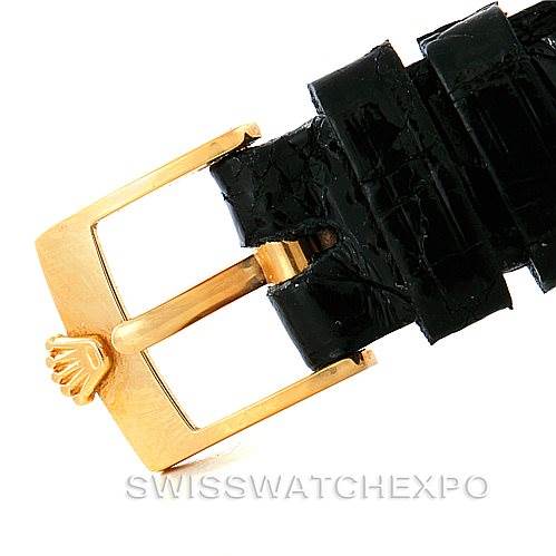 The image shows the buckle and strap end of a Rolex Cellini 6111 Women's Yellow Gold Black Dial 6111 Women's Yellow Gold Black Dial watch from a close-up angle.