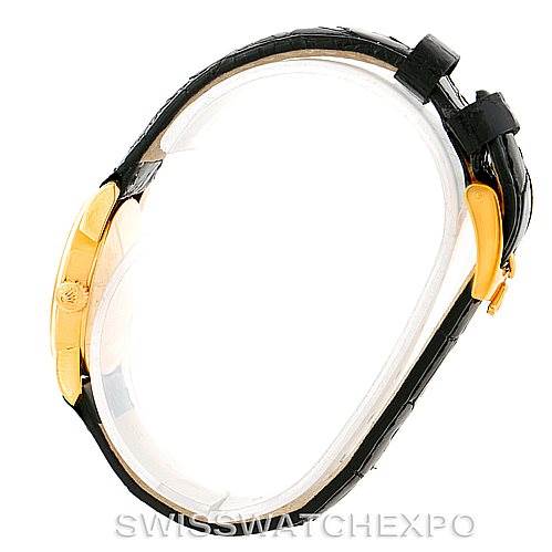 The image shows a side profile of a Rolex Cellini 6111 Women's Yellow Gold Black Dial 6111 Women's Yellow Gold Black Dial watch, highlighting its gold case and black leather strap.