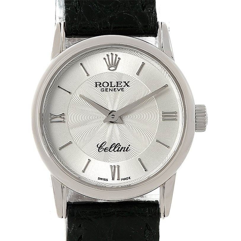 The image shows a front view of a Rolex Cellini 6111 Women's White Gold Silver Dial 6111 Women's White Gold Silver Dial watch, highlighting its dial, hands, crown, and leather strap.