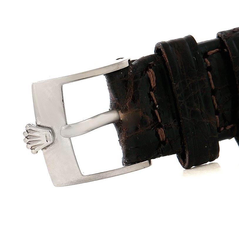 The image shows a side view of the buckle and leather strap of a Rolex Cellini 6229 Women's White Gold White Dial 6229 Women's White Gold White Dial watch.