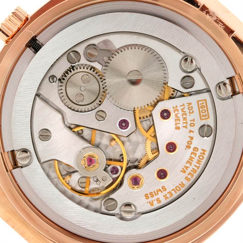 The image shows the back view of the Rolex Cellini 5320 Rose Gold White Dial 5320 Rose Gold White Dial watch, revealing its intricate mechanical movement.