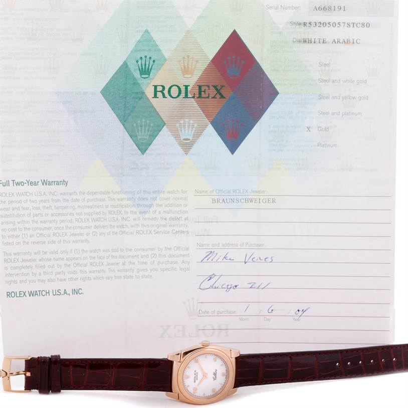The image shows a Rolex Cellini 5320 Rose Gold White Dial 5320 Rose Gold White Dial watch laying flat with its documentation in the background.