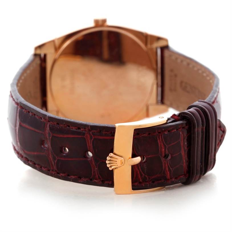 The image shows the back view of a Rolex Cellini 5320 Rose Gold White Dial 5320 Rose Gold White Dial watch, highlighting the leather strap and gold clasp.