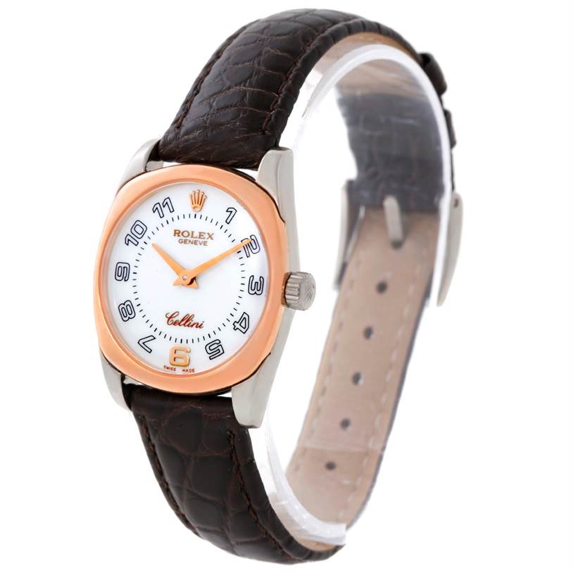 The image shows a slightly angled view of a Rolex Cellini 6229 Women's White Gold White Dial 6229 Women's White Gold White Dial watch highlighting the dial, case, crown, and leather strap.