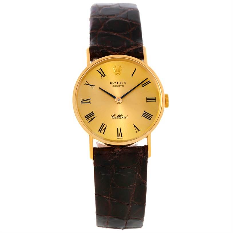 This image shows a front view of a Rolex Cellini 3810 Women's Yellow Gold Champagne Dial 3810 Women's Yellow Gold Champagne Dial watch with a gold dial and brown leather strap.