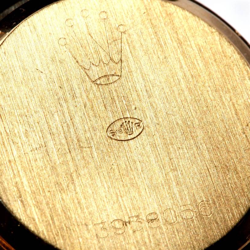 The image shows the back case of a Rolex Cellini 3810 Women's Yellow Gold Champagne Dial 3810 Women's Yellow Gold Champagne Dial watch, featuring the Rolex crown logo and model number engraving.