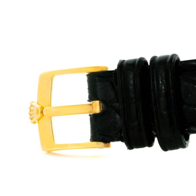 The image shows a close-up side view of a black leather strap with a golden buckle of a Rolex Cellini 6229 Women's Yellow Gold Black Dial 6229 Women's Yellow Gold Black Dial watch.