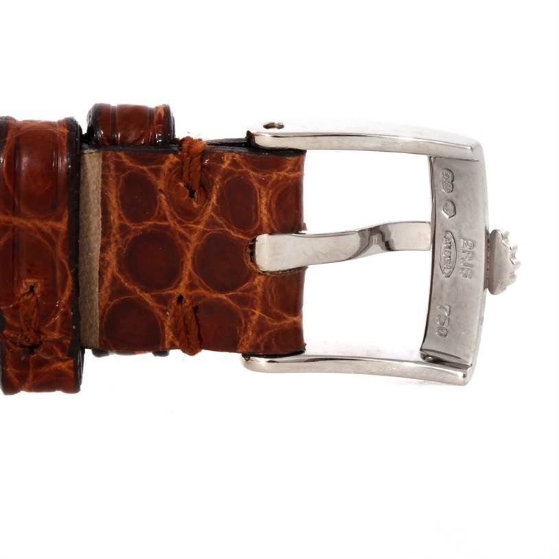 This image shows a close-up of the buckle and leather strap of a Rolex Cellini 6229 Women's White Gold White Dial 6229 Women's White Gold White Dial watch.