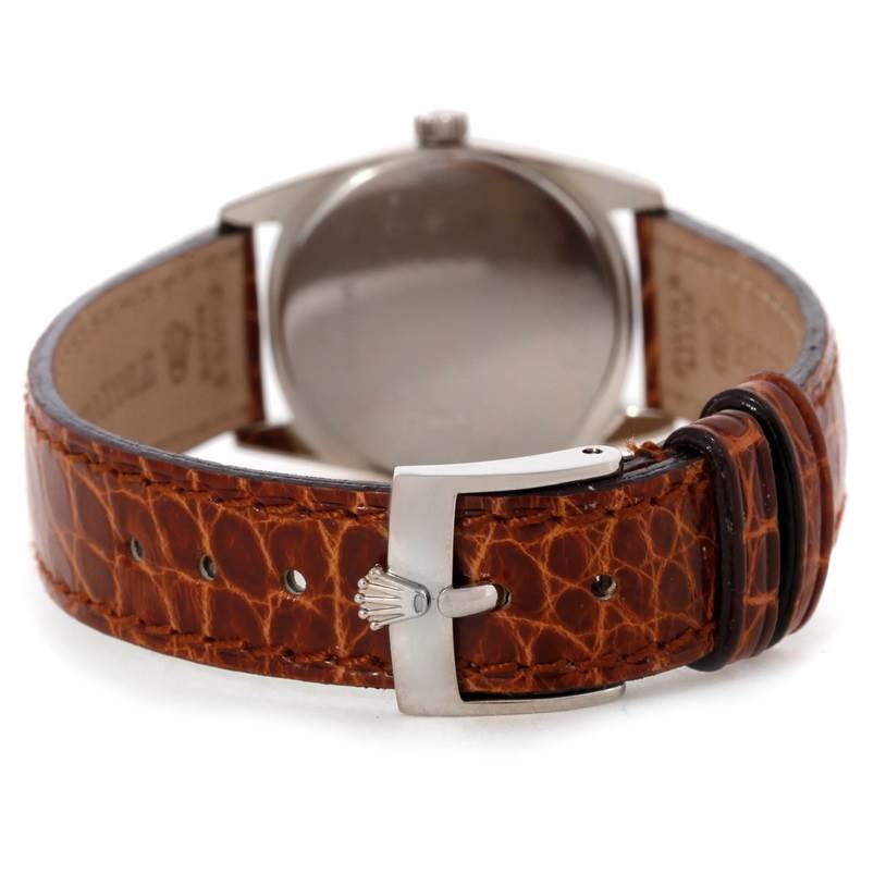 The image shows the back of a Rolex Cellini 6229 Women's White Gold White Dial 6229 Women's White Gold White Dial watch, focusing on its brown leather strap and metal buckle.