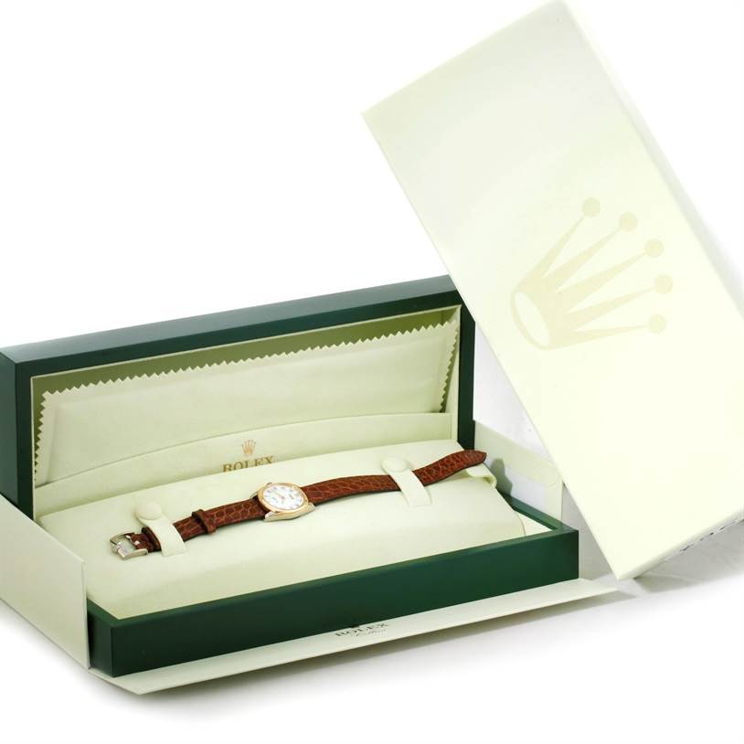 The image shows a Rolex Cellini 6229 Women's White Gold White Dial 6229 Women's White Gold White Dial watch in its opened packaging, displaying the watch with a leather strap on a cushioned insert.