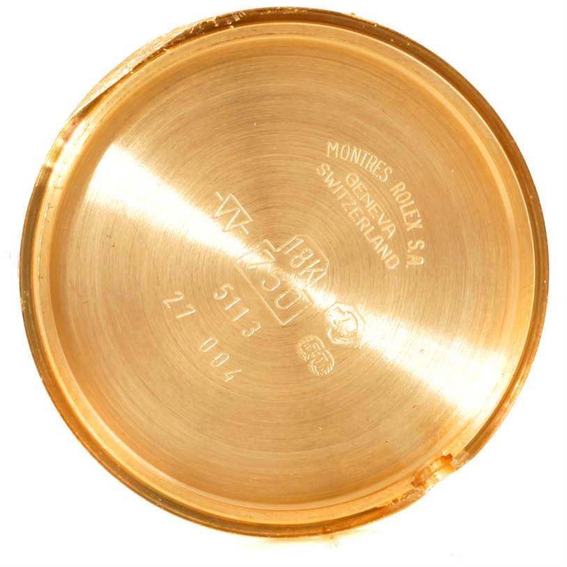 This image shows the inside case back of a Rolex Cellini 5113 Women's Yellow Gold Champagne Dial 5113 Women's Yellow Gold Champagne Dial watch, highlighting engravings and hallmarks.