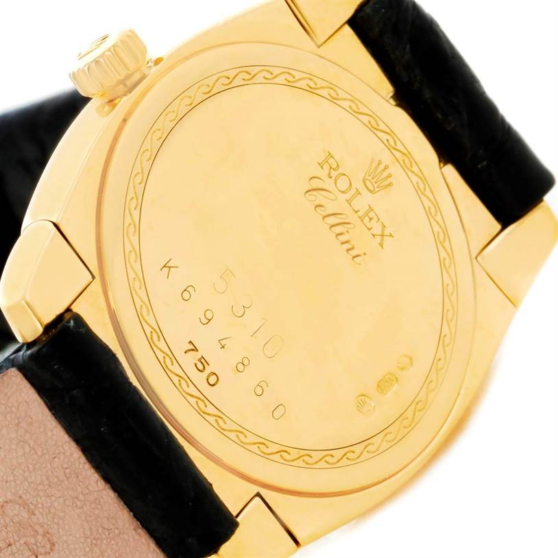 The image shows the backside of a Rolex Cellini 5310 Women's Yellow Gold Mother of Pearl Dial 5310 Women's Yellow Gold Mother of Pearl Dial watch, highlighting the watch case, crown, and part of the strap.